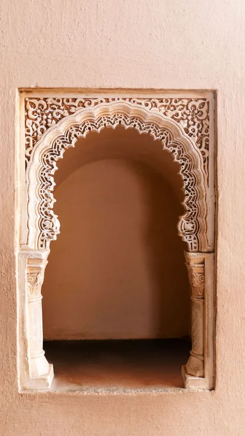 Carved Moorish arch at Parador de Granada inside the Alhambra